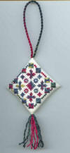 February 2004 Christmas Ornament Free Cross Stitch Pattern as Stitched by Wilma B. /  Design � Loretta Oliver / Stitching the Night Away
